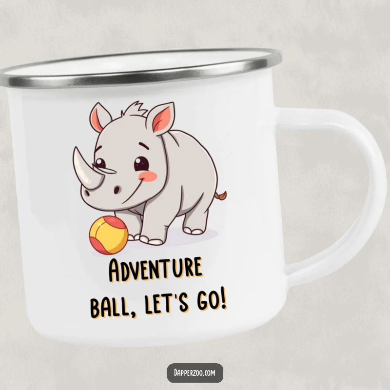 Funny rhinoceros calf camping mug with a happy calf playfully nudging a tiny, bright ball.