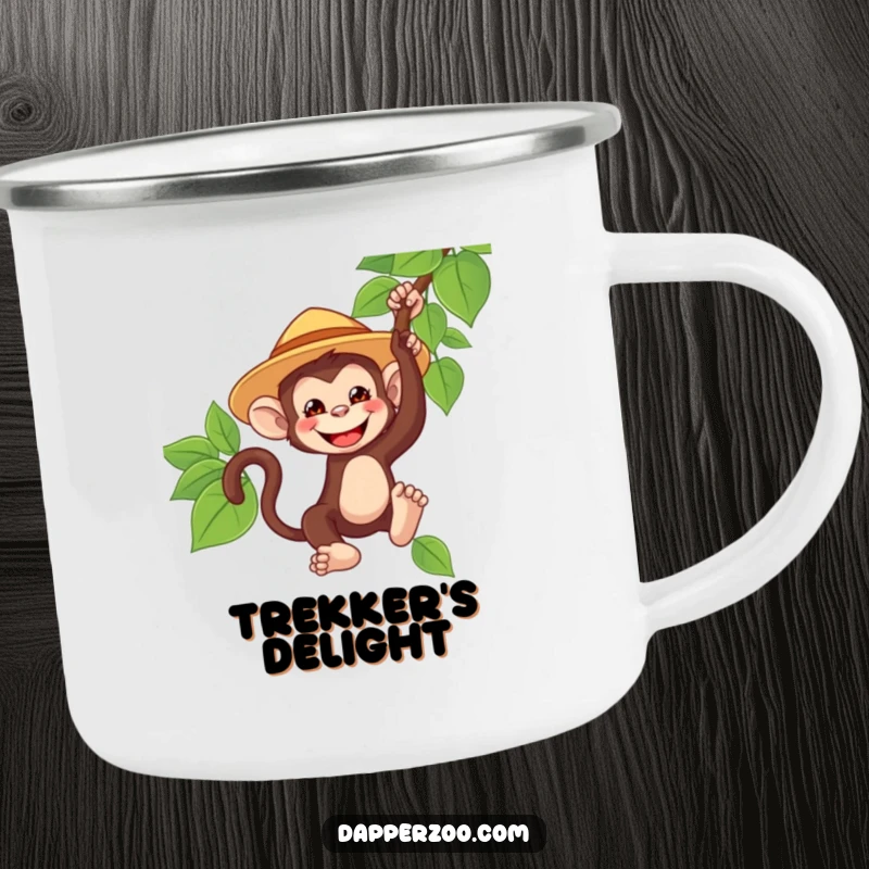 Funny monkey camping mug, wearing a tiny oversized safari hat, grinning and swinging from a vine, for humorous outdoor beverage enjoyment.