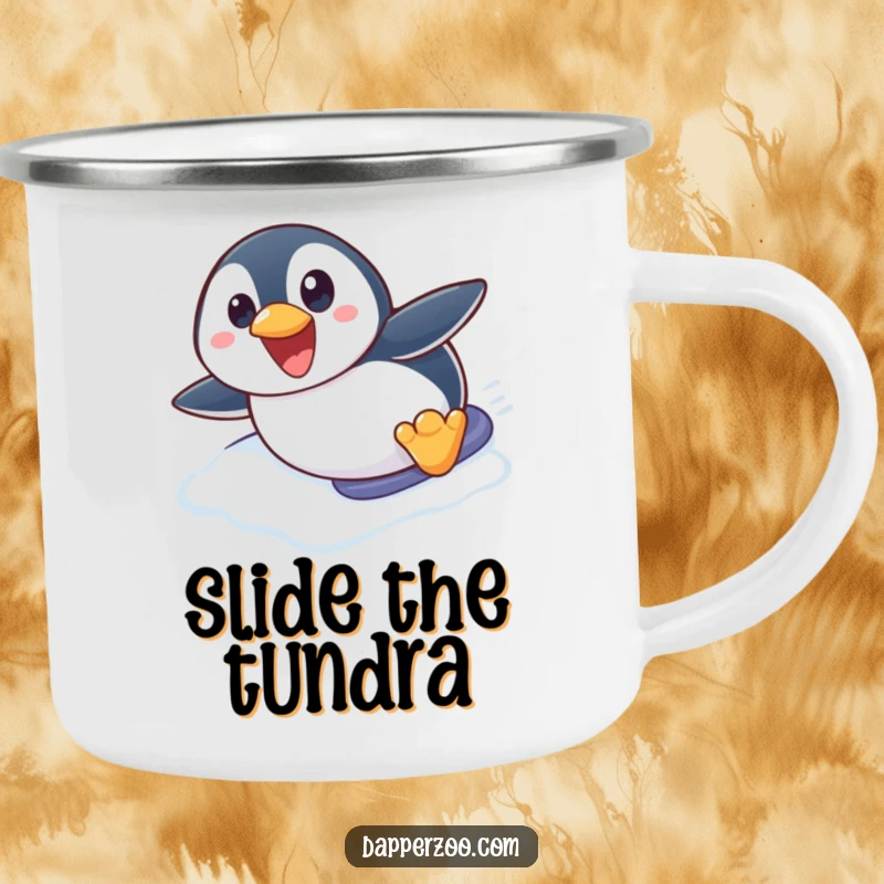 Funny penguin camping mug showing a cute penguin character excitedly sliding on its belly down an icy slope, perfect for outdoor enjoyment.