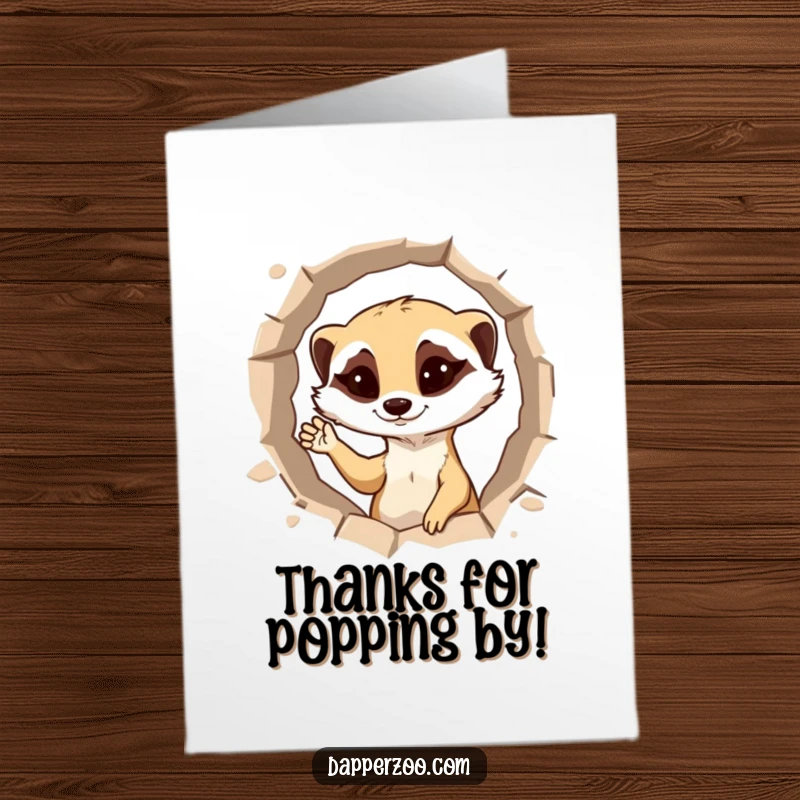 Funny Free Printable Meerkat Thank You Card: Mischievous meerkat peeking out of a hole, winking and waving to express thanks.