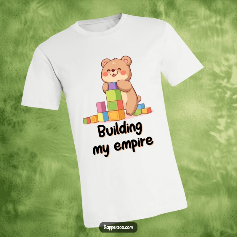 Funny t-shirt of a happy bear building a precarious tower of colorful blocks, ideal for a fun gift.